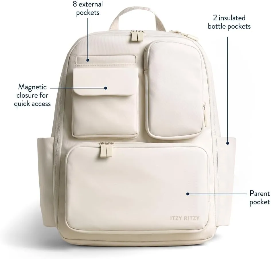 Itzy Ritzy Utility Diaper Bag Backpack  Features 17 Pockets (Including 2 Insulated Bottle Holders) & Trolley Sleeve and Includes Stroller Straps & Changing Pad  Part of the Belong Collection (Cream)